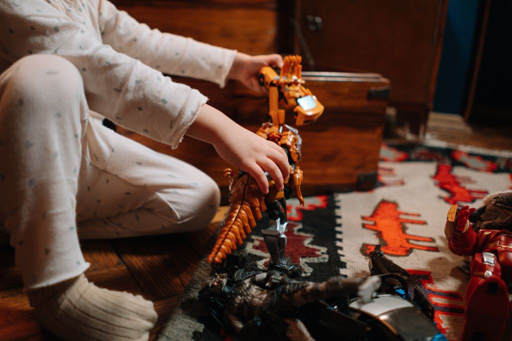 kid playing with toy